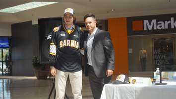 Philip Helt with Sarnia Sting GM Nick Sinclair. (photo by Jake Jeffrey blackburnnews.com)