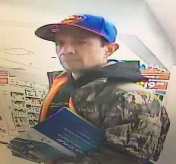 Chatham-Kent police are hoping to identify this man in connection with a theft investigation. (Photo courtesy of Chatham-Kent police)
