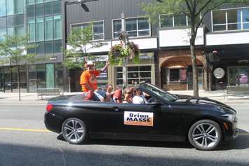 Windsor West MP Brian Masse waves to the crowd during the Windsor PrideFest Parade, August 13, 2017. Photo by Mark Brown/Blackburn News.