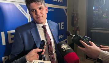 Windsor-Tecumseh MPP Andrew Dowie speaks to reporters after declaring victory in Tecumseh, February 27, 2025. Photo by Mark Brown/WindsorNewsToday.ca.