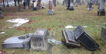 Police are investigating mass damage to over 60 headstones at the St. Vincent De Paul Cemetery in Mitchell. (Photo courtesy of the OPP West Region Twitter page)