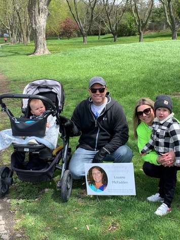 Katie and Adam Holmes and family with their memorial sign along Mud Creek Trail, as part of the
2021 Hike for Hospice Chatham-Kent (Submitted photo)