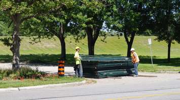 Centennial Park fencing comes down July 16, 2015 (BlackburnNews.com Photo by Briana Carnegie)