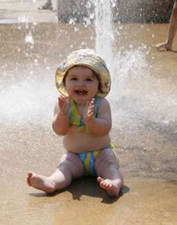 child at wading pool courtesy City of London website