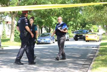 Windsor police on scene of a pedestrian being hit in west Windsor on July 30, 2015. (Photo by Jason Viau)