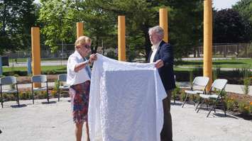 Norma Cox and Mayor Mike Bradley unveil the memorial for the late Mary-Ann Clark June 24, 2015 (BlackburnNews.com Photo by Briana Carnegie)