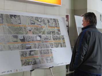 London man reviews proposed BRT routes  at a public meeting at Budweiser Gardens, May 3, 2017. (Photo by Miranda Chant, Blackburn News)
