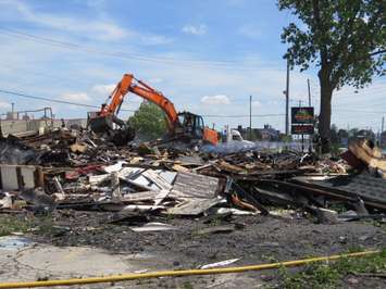 London firefighters continue to douse hotspots after a fire reduced the former Hook's Restaurant at Wharncliffe and Southdale to rubble, May 30, 2018. (Photo by Miranda Chant, Blackburn News) 