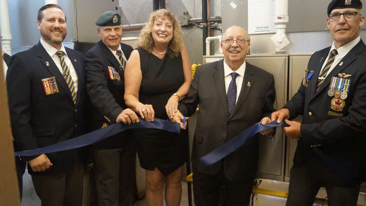 A ribbon cutting inside Sarnia Legion 62 for the new HVAC system (Photo by: Lindsay Newman/ Blackburn Media)