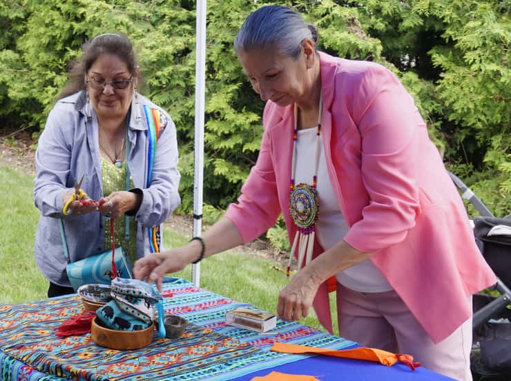 Attendees were invited to make tobacco ties during the grand opening of the Indigenous Outdoor Gathering Space at Lambton College. June 18, 2026. (Photo by Natalia Vega) 