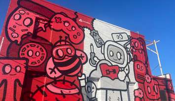 The Haunted Zoo mural on the Red Piston building on Chatham Street, October 24, 2025. (Photo by Maureen Revait) 