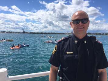 Sarnia Police Inspector Doug Warn speaks to Blackburn News by Sarnia Bay where participants in the Pt. Huron float down ended up. August 21, 2016 BlackburnNews.com photo by Melanie Irwin.