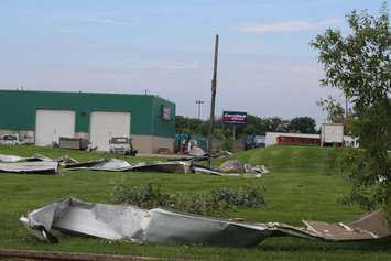 Crews assess and clean up the damage left near the EC Row Expressway and Central Avenue in Windsor on August 25, 2016 after a tornado hit the area. (Photo by Ricardo Veneza)