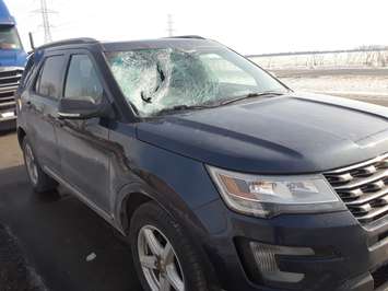 Chatham-Kent OPP said a piece of ice fell from the roof of a tractor trailer and smashed into this vehicle's windshield on February 2, 2019. (Photo courtesy of Chatham-Kent OPP)