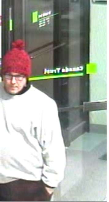 Police are looking for this man following a robbery at  a bank in Simcoe, February 1, 2018. (Photo courtesy of the OPP)