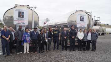 The decals of two impaired driving victims unveiled on the backs of Westcan trucks. October 4, 2018. (Photo by Colin Gowdy, BlackburnNews)