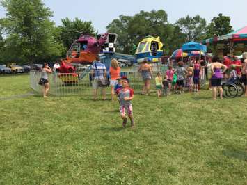 Residents from Thamesville and the surrounding area attend the 40th annual Threshing Festival in Thamesville, July 4, 2015. (Photo by the Blackburn Radio Summer Patrol)
