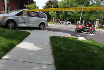 Windsor police investigate a crash involving a motorcycle and van at the intersection of Chilver Rd. and Richmond St., June 4, 2015. (Photo by Jason Viau)