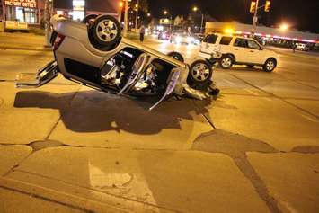 One vehicle flipped following a collision at the intersection of Howard Ave. and Tecumseh Rd. E, May 19, 2015. (Photo by Jason Viau)