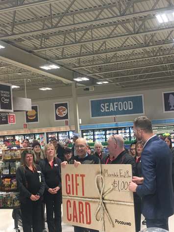 A donation was made to the local foodbank during the official opening of the new Foodland in Markdale. (Submitted photo)
