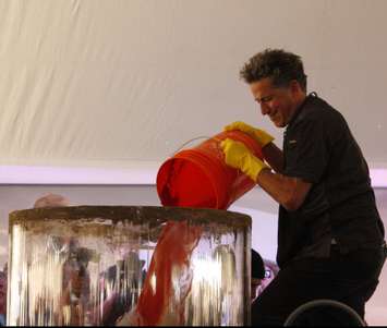 Celebrity chef Bob Blumer pours tomato juice into the World Records attempt at the largest Bloody Mary cocktail, September 19, 2018.  (Photo by Angelica Haggert)