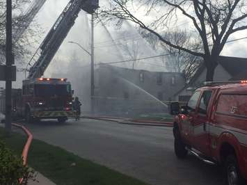 Firefighters battle a blaze on Sandwich St. near Chippawa St. in Windsor, April 11, 2017. (Photo by Maureen Revait)