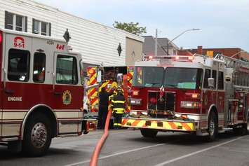 Firefighters at the scene of an apartment fire at the corner of Wyandotte St. E and Gladstone Ave. in Windsor, May 20, 2017.  (Photo by Adelle Loiselle)