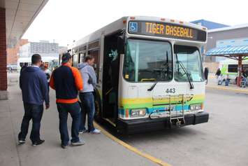 Detroit Tigers baseball fans board the Transit Windsor Tunnel Bus on Opening Day 2015, April 6, 2015. (Photo by Mike Vlasveld)