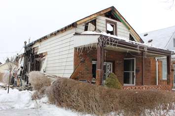 Windsor firefighters respond to a blaze at 574 Elliott St. E on February 18, 2015. (Photo by Jason Viau)