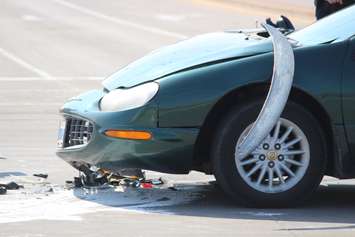 One person has been sent to hospital following a crash at the intersection of Lauzon Rd. and McHugh St., April 1, 2015. (Photo by Jason Viau)