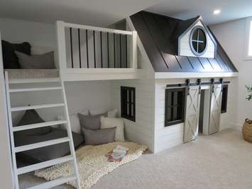 A built in playhouse at 3536 Grand Oak Crossing. (Photo by Miranda Chant, Blackburn News)