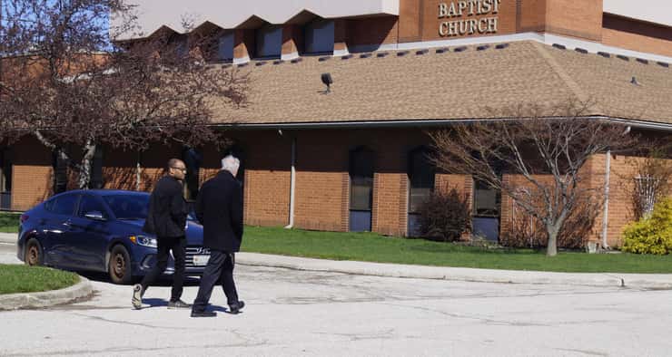 Sarnia Mayor Mike Bradley and Councillor Adam Kilner walking into Temple Baptist Church. April 17, 2026. (Photo by Natalia Vega)