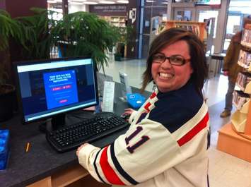 Chatham-Kent Library staff member Sarah Hart casts a vote for Memorial Arena in the Hockeyville Kraft challenge. (Photo by Mike James)