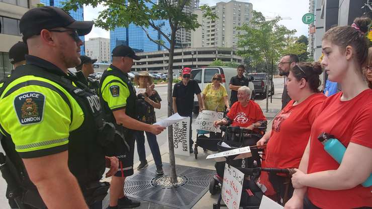 Protestors were met with police (Image courtesy of ACORN Canada)