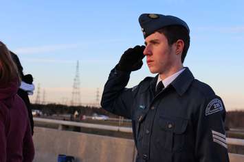 Supporters come out to the Communications Rd. overpass on Hwy. 401 for the repatriation ceremony of fallen veteran and Wheatley native John Gallagher on November 20, 2015. (Photo by Ricardo Veneza)
