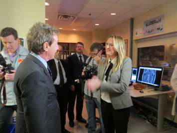 Actor Martin Short greets Imaging Scientist Paula Foster at Robarts Research Institute at Western University, November 18, 2015. (Photo by Miranda Chant, BlackburnNews)