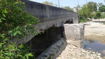 A view of the east side of the Howson Dam shows significant erosion (Photo by Adam Bell for BlackburnNews.com)