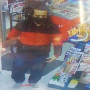 Chatham-Kent police are looking for this man in connection with a theft investigation at a local gas station. (Photo courtesy of Chatham-Kent police)