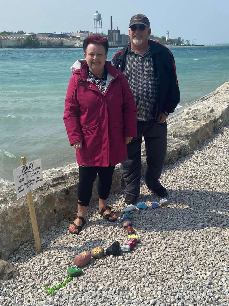 Wendy Marsden and her partner Rick launch Rocky the rock snake display along the St. Clair River waterfront in Point Edward. June 2023. Submitted photo.
