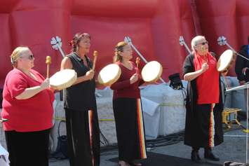 Theresa Sims (right) and the Spirit of the Four Directions Singers perform a welcome song at the opening of the SesquiDome in Windsor on July 7, 2017 (Photo by Mark Brown/Blackburn News)
