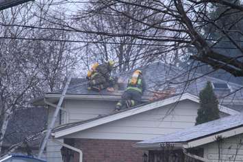 Chatham-Kent firefighters respond to a house fire in Blenheim on March 24, 2016. (Photo by Ricardo Veneza)