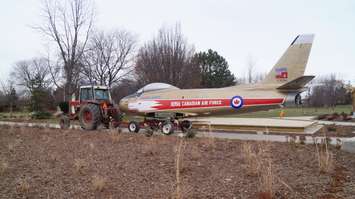 Sarnia's F-86 Sabre Golden Hawk is returned to Germain Park. December 8, 2014 (BlackburnNews.com photo by Jake Jeffrey)