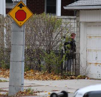 Windsor police investigate a man barricaded inside of an apartment on the corner of Lincoln Rd. and Richmond St., November 12, 2014. (photo by Mike Vlasveld)