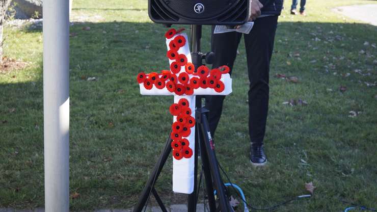 The cross full of poppies for Remembrance Day, November 8, 2024 (Photo by: Lindsay Newman/ Blackburn Media)