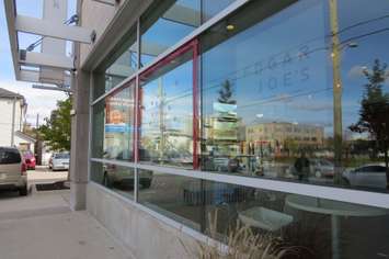 Damage to windows at Goodwill Industries, October 31, 2016. (Photo by Miranda Chant, Blackburn News.)