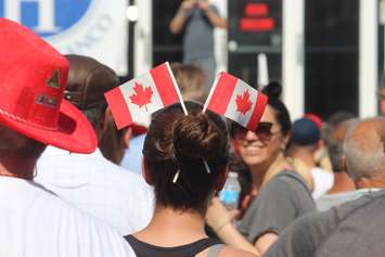 A woman dressed for Canada Day celebrations. (File photo by Adelle Loiselle)