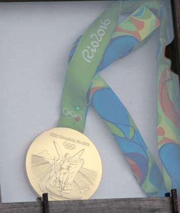 Derek Drouin's 2016 Olympic gold medal (BlackburnNews.com photo by Dave Dentinger)