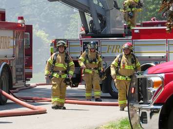 File photo of London firefighters responding to a working fire. (Photo by Miranda Chant, Blackburn News)
