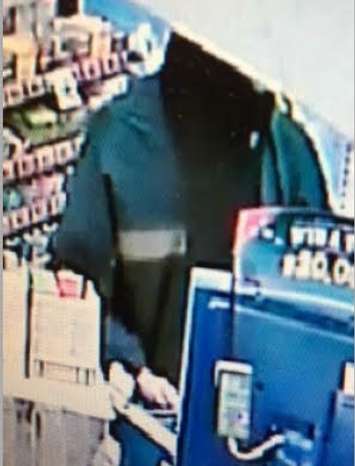 CK police are searching for this suspect following a robbery at gas station in Blenheim,  January 18, 2017. (Photo courtesy of the Chatham-Kent Police Service)