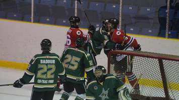Pushing and shoving after the whistle near the St Thomas net. (Photo by Jake Jeffrey)